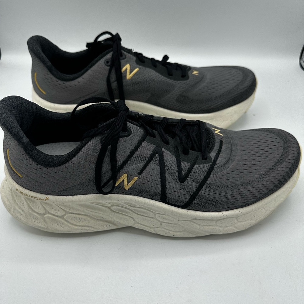 New Balance Black and Gold Athletic Sneakers. Worn only once.
